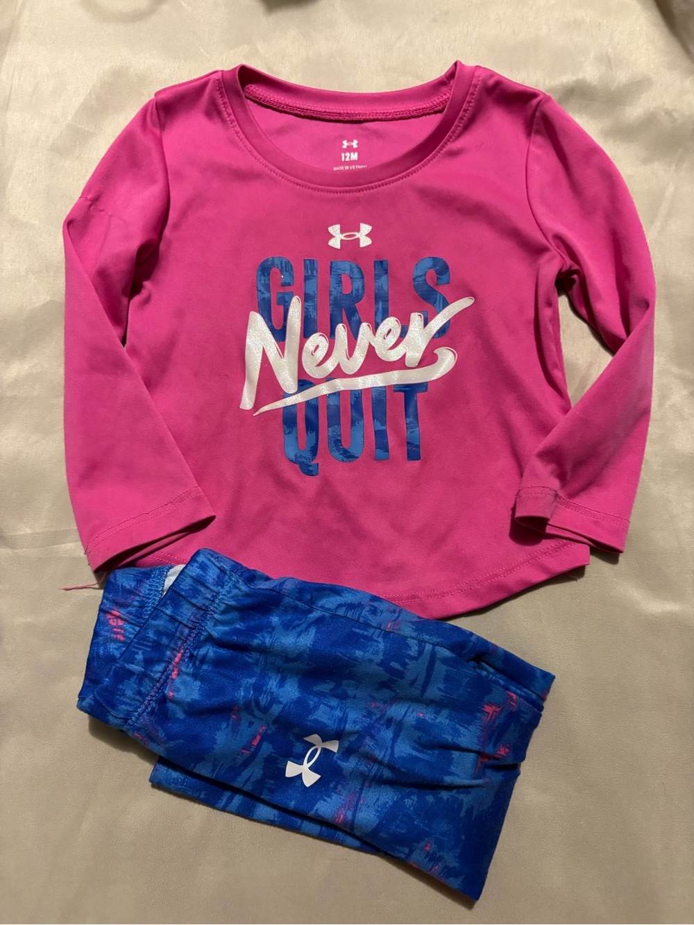 Under Armour Girls Pink Long Sleeve Tee with Blue Logo Graphics